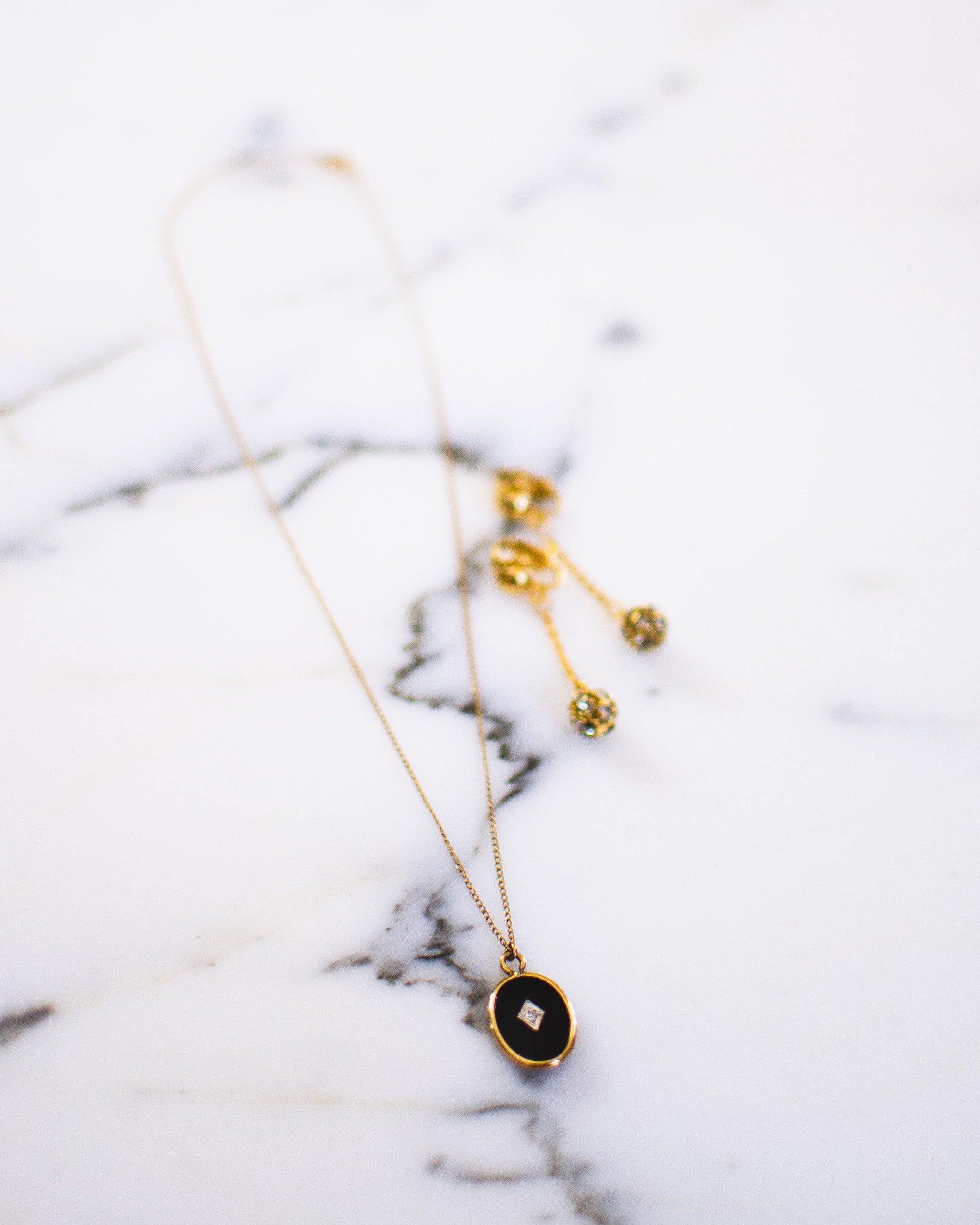 Vintage Victorian Revival Onyx Lucite Oval Pendant with Diamond by Avon - Vintage Meet Modern Vintage Jewelry - Chicago, Illinois - #oldhollywoodglamour #vintagemeetmodern #designervintage #jewelrybox #antiquejewelry #vintagejewelry