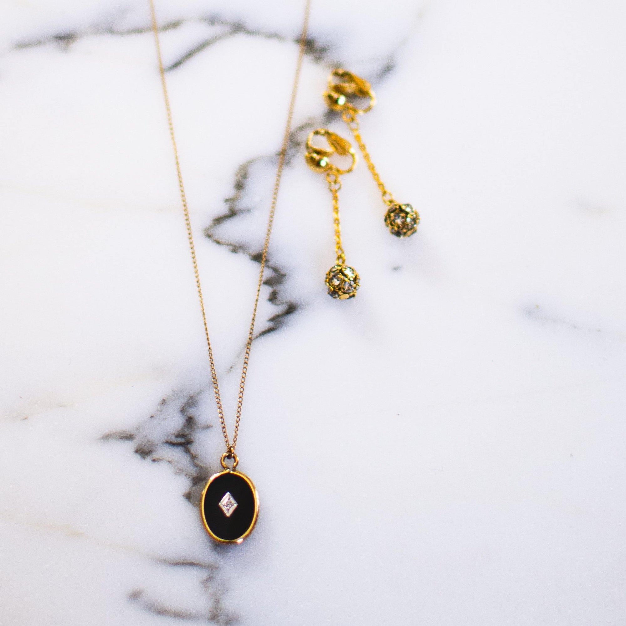 Vintage Victorian Revival Onyx Lucite Oval Pendant with Diamond by Avon - Vintage Meet Modern Vintage Jewelry - Chicago, Illinois - #oldhollywoodglamour #vintagemeetmodern #designervintage #jewelrybox #antiquejewelry #vintagejewelry