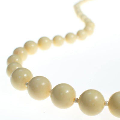 Vintage 1960s Long Ivory Lucite Long Graduated Beaded Necklace by 1960s - Vintage Meet Modern Vintage Jewelry - Chicago, Illinois - #oldhollywoodglamour #vintagemeetmodern #designervintage #jewelrybox #antiquejewelry #vintagejewelry