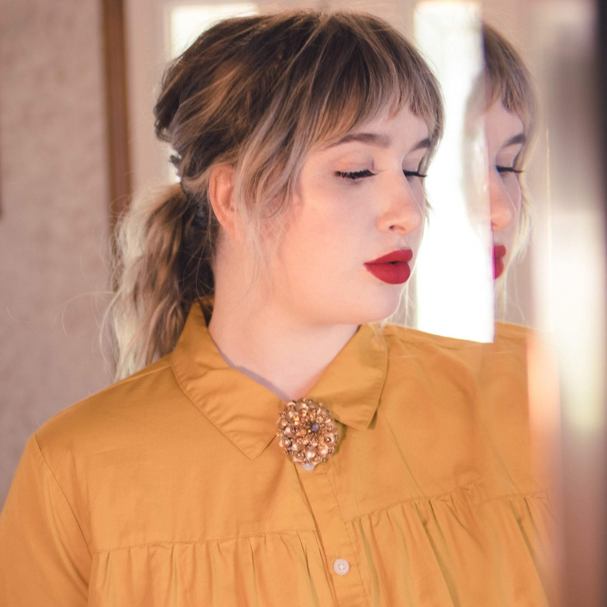 Vintage 1960s Champange and Amber Rhinestone Sparkling Bejeweled Rhinestone Brooch by 1960s - Vintage Meet Modern Vintage Jewelry - Chicago, Illinois - #oldhollywoodglamour #vintagemeetmodern #designervintage #jewelrybox #antiquejewelry #vintagejewelry