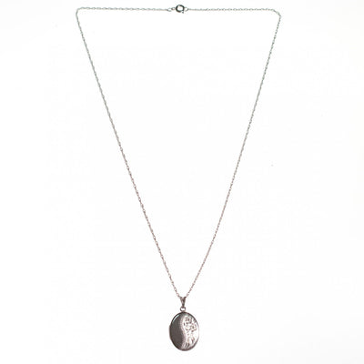 Vintage Art Nouveau Sterling Silver Embossed Locket by Sterling SIlver - Vintage Meet Modern Vintage Jewelry - Chicago, Illinois - #oldhollywoodglamour #vintagemeetmodern #designervintage #jewelrybox #antiquejewelry #vintagejewelry