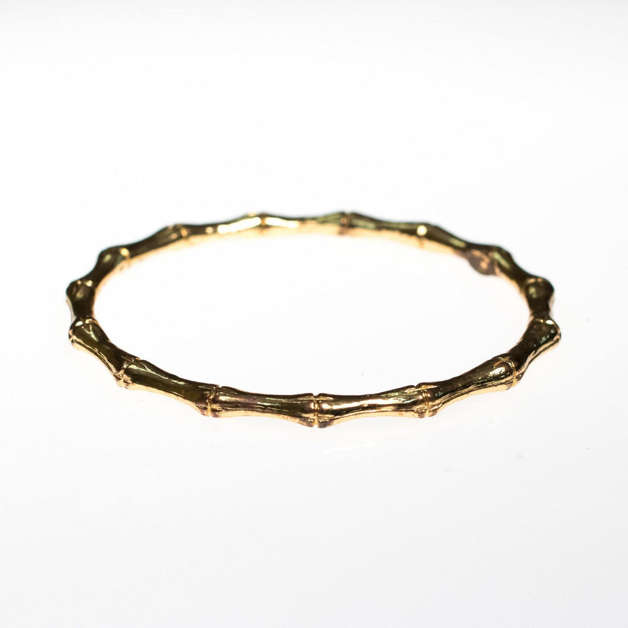 Vintage Kenneth Jay Lane Gold Bamboo Bangle Bracelet by Kenneth Jay Lane - Vintage Meet Modern Vintage Jewelry - Chicago, Illinois - #oldhollywoodglamour #vintagemeetmodern #designervintage #jewelrybox #antiquejewelry #vintagejewelry
