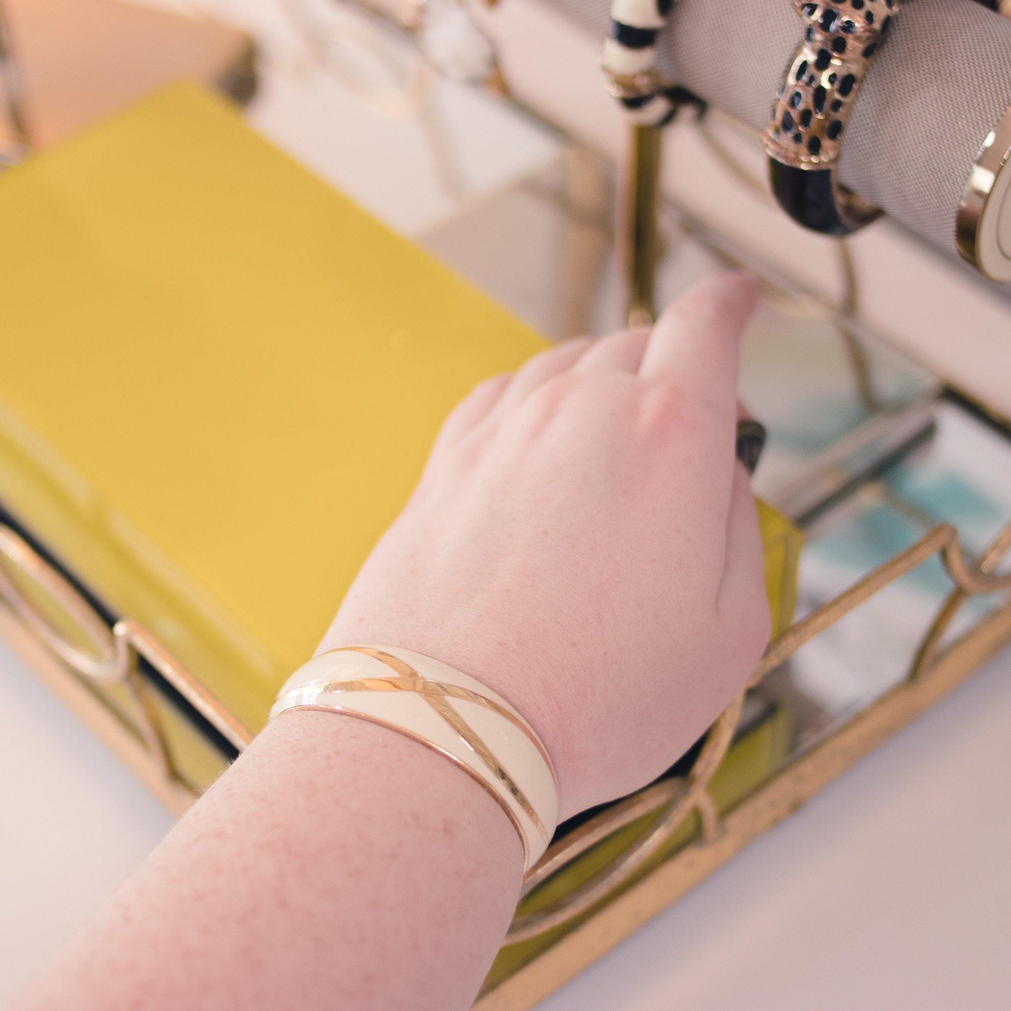 Vintage Avon Gold and White Enamel Cuff Bracelet by Avon - Vintage Meet Modern Vintage Jewelry - Chicago, Illinois - #oldhollywoodglamour #vintagemeetmodern #designervintage #jewelrybox #antiquejewelry #vintagejewelry