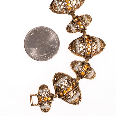Vintage Victorian Revival Ornate Antique Gold Tone Bracelet with Citrine Rhinestones and Faux Pearls by 1980s - Vintage Meet Modern Vintage Jewelry - Chicago, Illinois - #oldhollywoodglamour #vintagemeetmodern #designervintage #jewelrybox #antiquejewelry #vintagejewelry