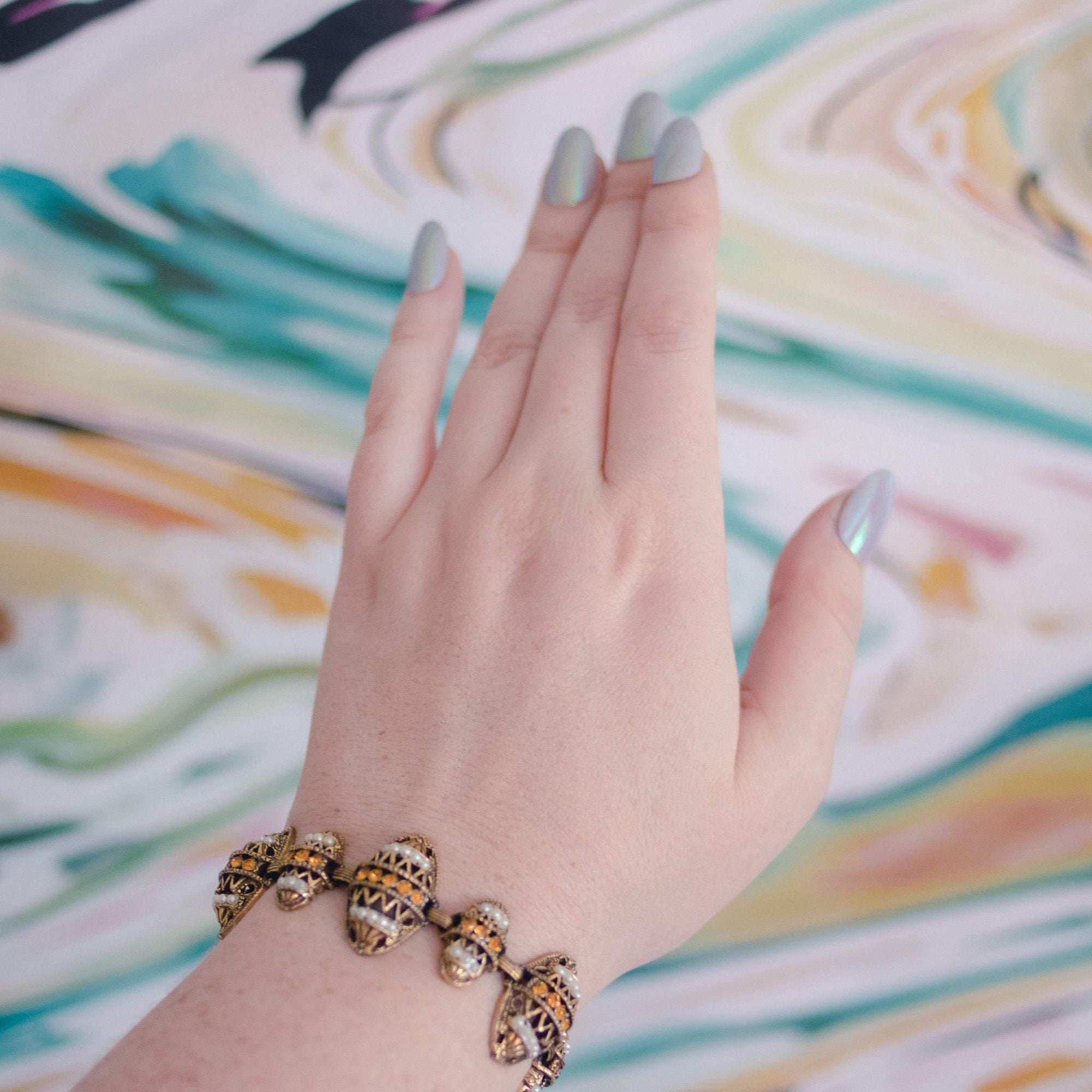 Vintage Victorian Revival Ornate Antique Gold Tone Bracelet with Citrine Rhinestones and Faux Pearls by 1980s - Vintage Meet Modern Vintage Jewelry - Chicago, Illinois - #oldhollywoodglamour #vintagemeetmodern #designervintage #jewelrybox #antiquejewelry #vintagejewelry