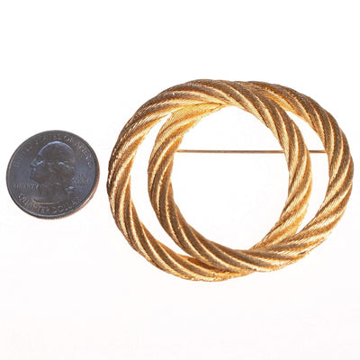 Vintage Christian Dior Double Knot Brooch by Christian Dior - Vintage Meet Modern Vintage Jewelry - Chicago, Illinois - #oldhollywoodglamour #vintagemeetmodern #designervintage #jewelrybox #antiquejewelry #vintagejewelry