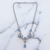 Vintage 1950s Silver Filigree Lavalier Necklace with Blue Crystals by Sterling Silver - Vintage Meet Modern Vintage Jewelry - Chicago, Illinois - #oldhollywoodglamour #vintagemeetmodern #designervintage #jewelrybox #antiquejewelry #vintagejewelry