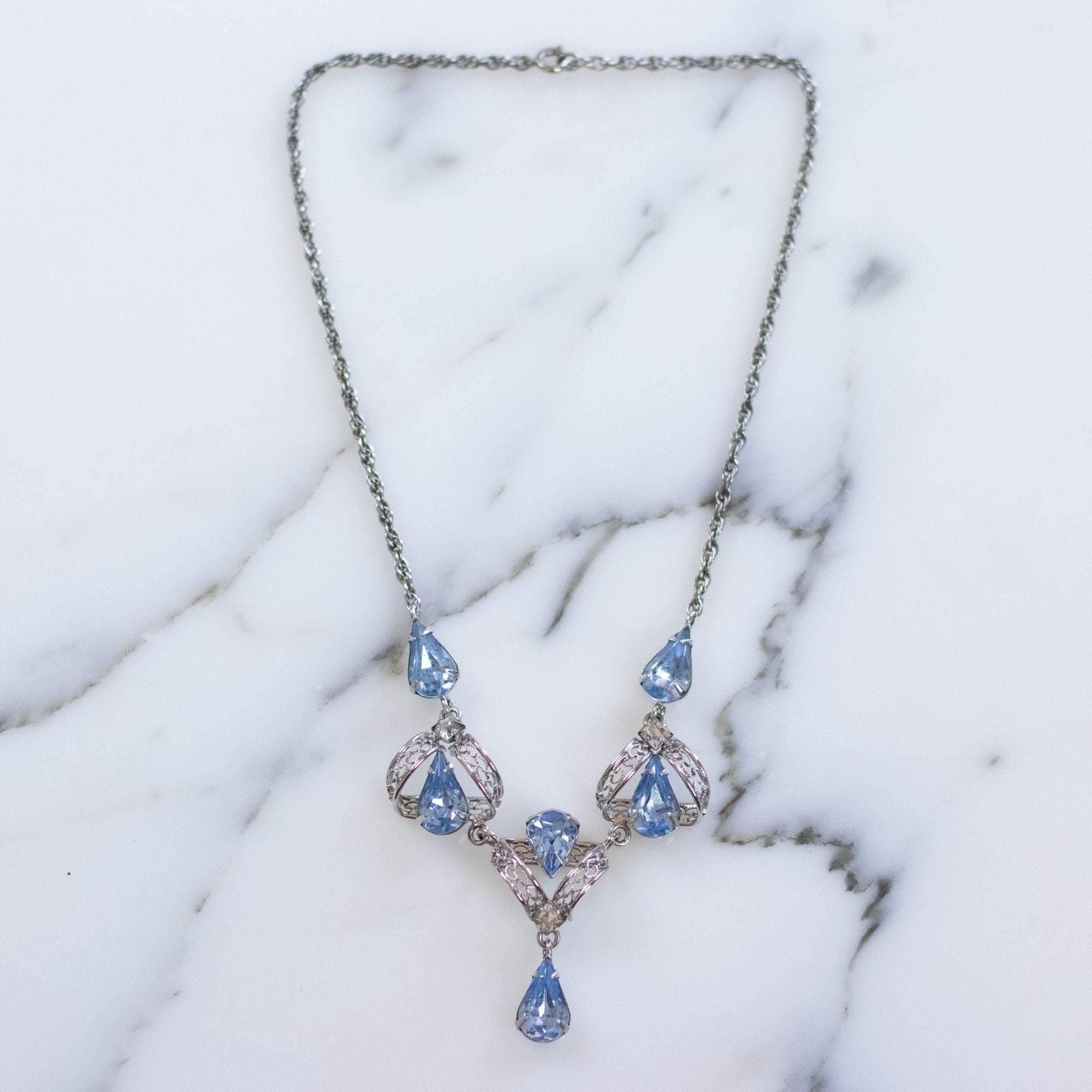 Vintage 1950s Silver Filigree Lavalier Necklace with Blue Crystals by Sterling Silver - Vintage Meet Modern Vintage Jewelry - Chicago, Illinois - #oldhollywoodglamour #vintagemeetmodern #designervintage #jewelrybox #antiquejewelry #vintagejewelry