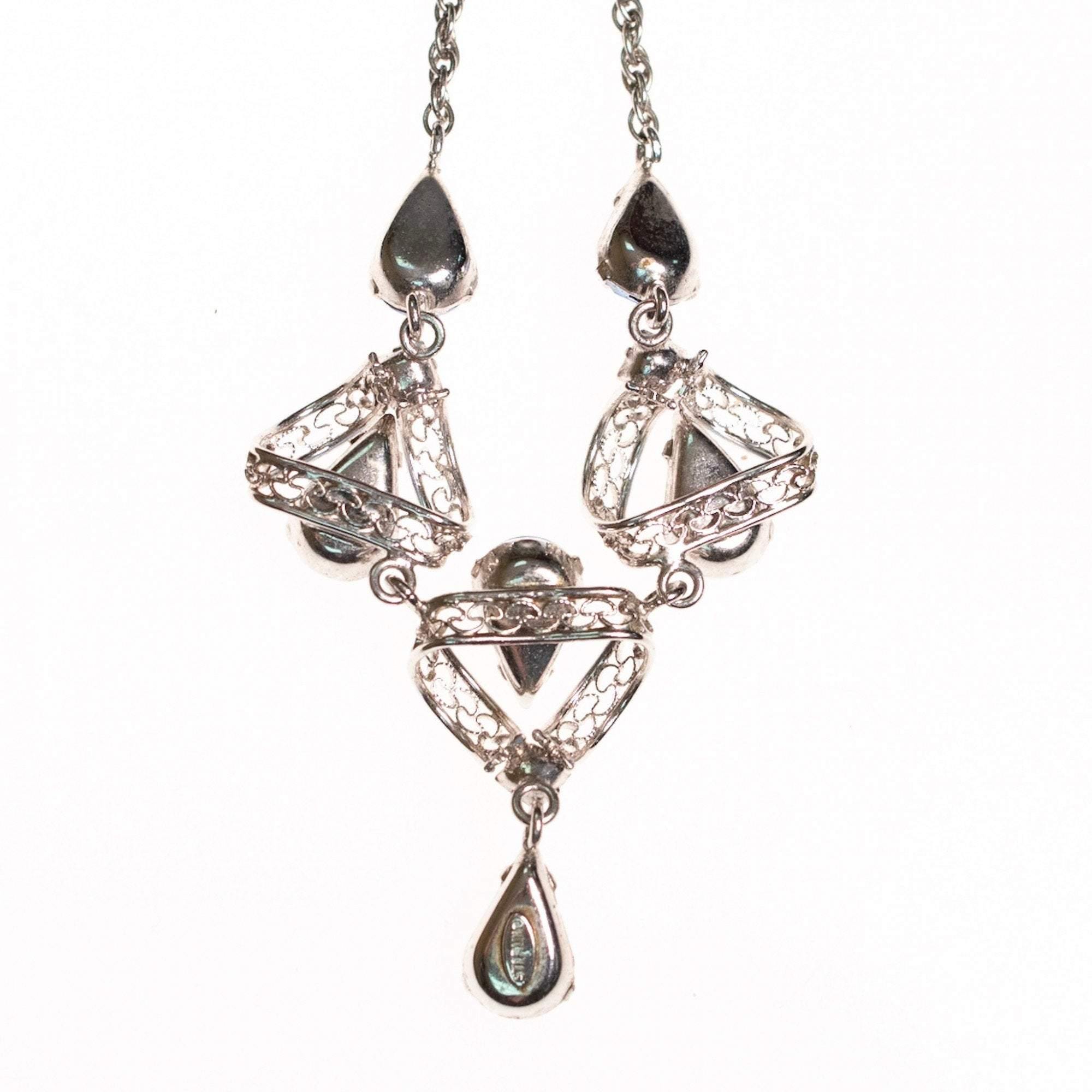 Vintage 1950s Silver Filigree Lavalier Necklace with Blue Crystals by Sterling Silver - Vintage Meet Modern Vintage Jewelry - Chicago, Illinois - #oldhollywoodglamour #vintagemeetmodern #designervintage #jewelrybox #antiquejewelry #vintagejewelry