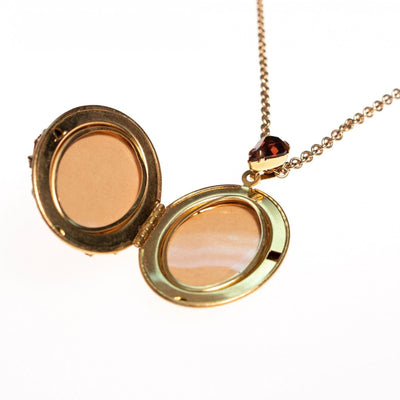 Vintage 1950s Hobe Cameo Locket with Amber, Citrine, and Light Green Rhinestones by Hobe - Vintage Meet Modern Vintage Jewelry - Chicago, Illinois - #oldhollywoodglamour #vintagemeetmodern #designervintage #jewelrybox #antiquejewelry #vintagejewelry