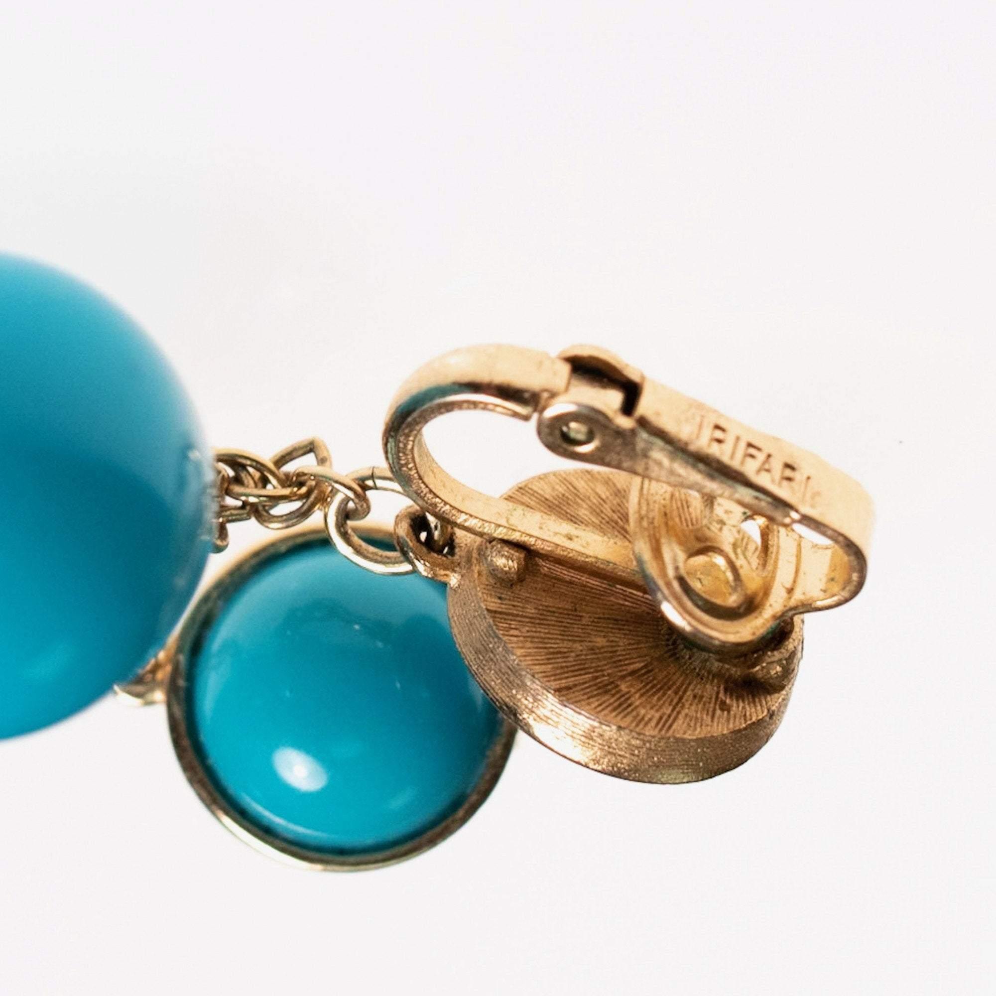 Vintage Crown Trifari Turquoise Lucite Dangling Drop Earrings by Crown Trifari - Vintage Meet Modern Vintage Jewelry - Chicago, Illinois - #oldhollywoodglamour #vintagemeetmodern #designervintage #jewelrybox #antiquejewelry #vintagejewelry