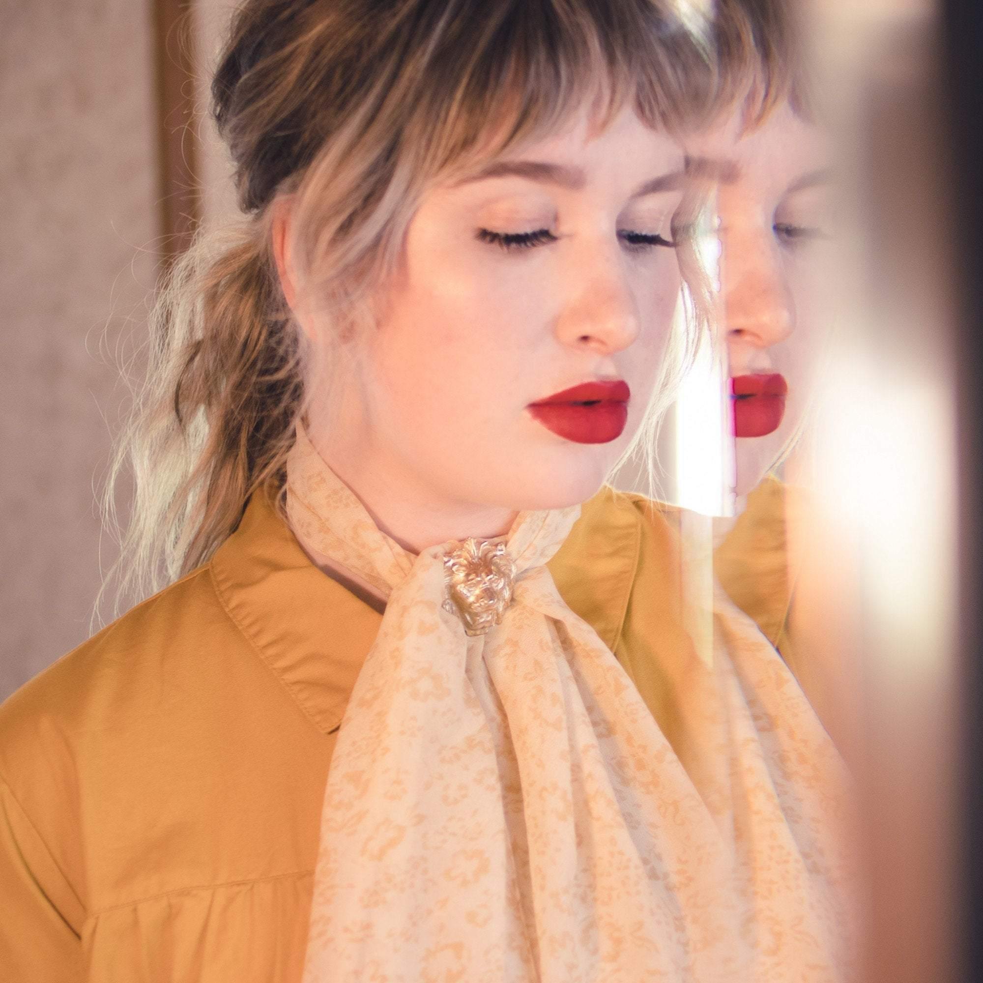 Vintage Accessocraft NYC Gold Lions Head Scarf Clip by Accessocraft NYC - Vintage Meet Modern Vintage Jewelry - Chicago, Illinois - #oldhollywoodglamour #vintagemeetmodern #designervintage #jewelrybox #antiquejewelry #vintagejewelry