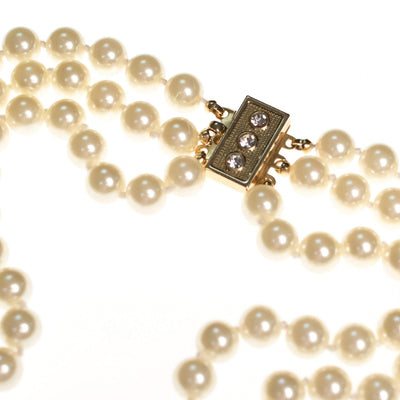 Vintage Luxurious Triple Strand Glass Pearl Necklace with Oval Pearl and Diamante Medallion by 1980s - Vintage Meet Modern Vintage Jewelry - Chicago, Illinois - #oldhollywoodglamour #vintagemeetmodern #designervintage #jewelrybox #antiquejewelry #vintagejewelry