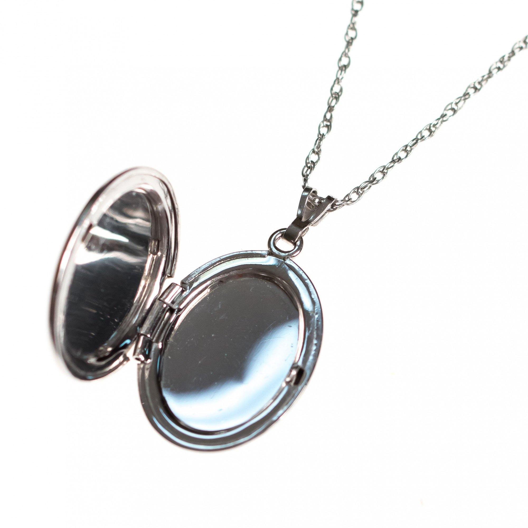 Vintage Art Nouveau Sterling Silver Embossed Locket by Sterling SIlver - Vintage Meet Modern Vintage Jewelry - Chicago, Illinois - #oldhollywoodglamour #vintagemeetmodern #designervintage #jewelrybox #antiquejewelry #vintagejewelry