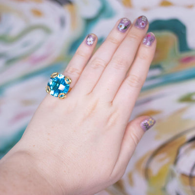 Vintage Blue Crystal Cocktail Statement Ring in Elegant Gold Tone Setting by 1980s - Vintage Meet Modern Vintage Jewelry - Chicago, Illinois - #oldhollywoodglamour #vintagemeetmodern #designervintage #jewelrybox #antiquejewelry #vintagejewelry