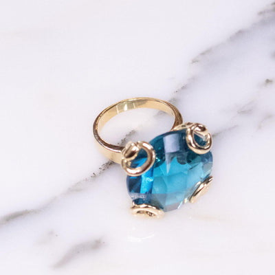 Vintage Blue Crystal Cocktail Statement Ring in Elegant Gold Tone Setting by 1980s - Vintage Meet Modern Vintage Jewelry - Chicago, Illinois - #oldhollywoodglamour #vintagemeetmodern #designervintage #jewelrybox #antiquejewelry #vintagejewelry