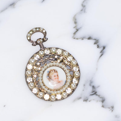 Vintage 1950s Faux Pocket Watch Brooch Decorated with Ladies Portrait in Limoges with Faux Pearls and Diamante Accents by Limoges - Vintage Meet Modern Vintage Jewelry - Chicago, Illinois - #oldhollywoodglamour #vintagemeetmodern #designervintage #jewelrybox #antiquejewelry #vintagejewelry