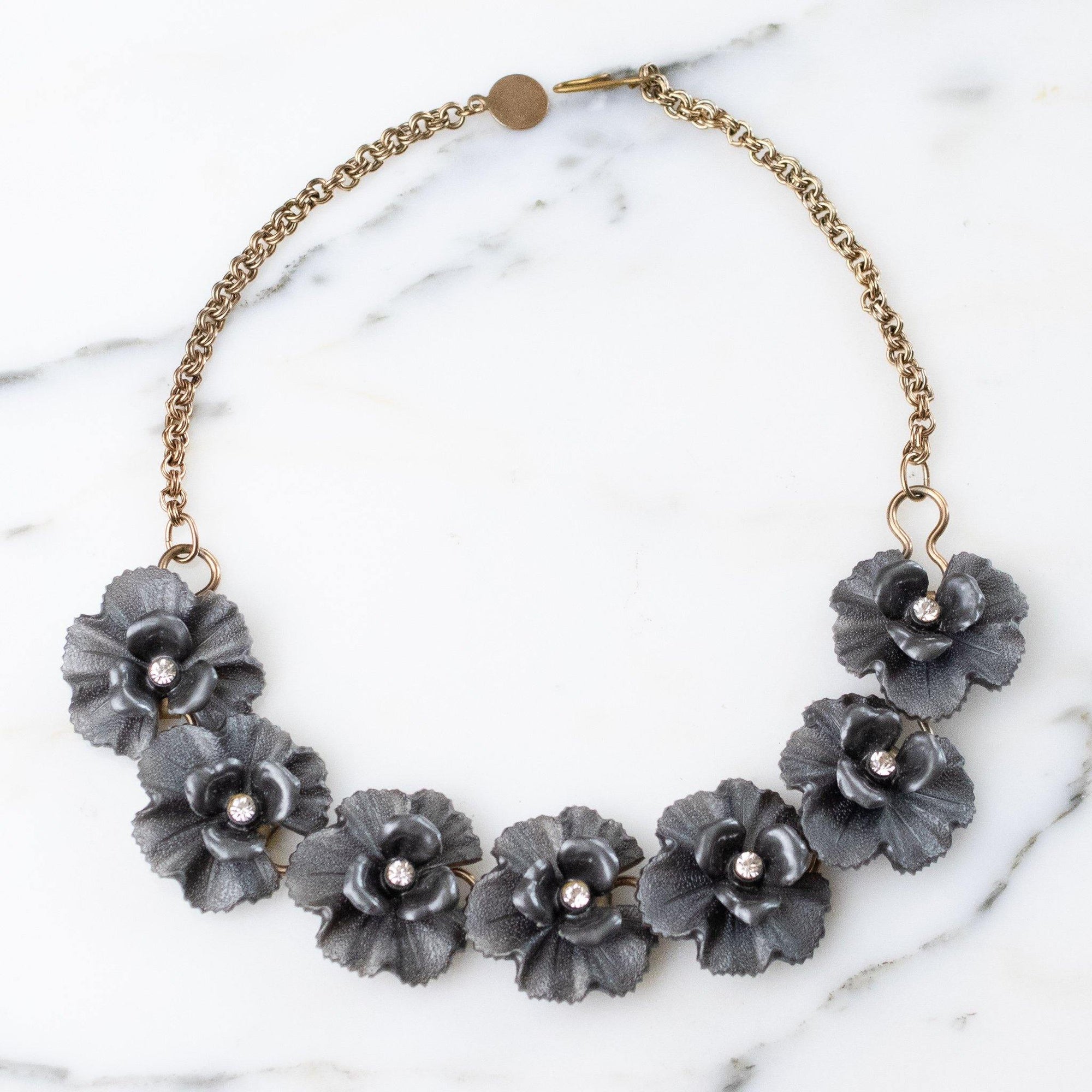 Vintage Grey Lucite Flower Necklace with Rhinestones Center by 1950s - Vintage Meet Modern Vintage Jewelry - Chicago, Illinois - #oldhollywoodglamour #vintagemeetmodern #designervintage #jewelrybox #antiquejewelry #vintagejewelry
