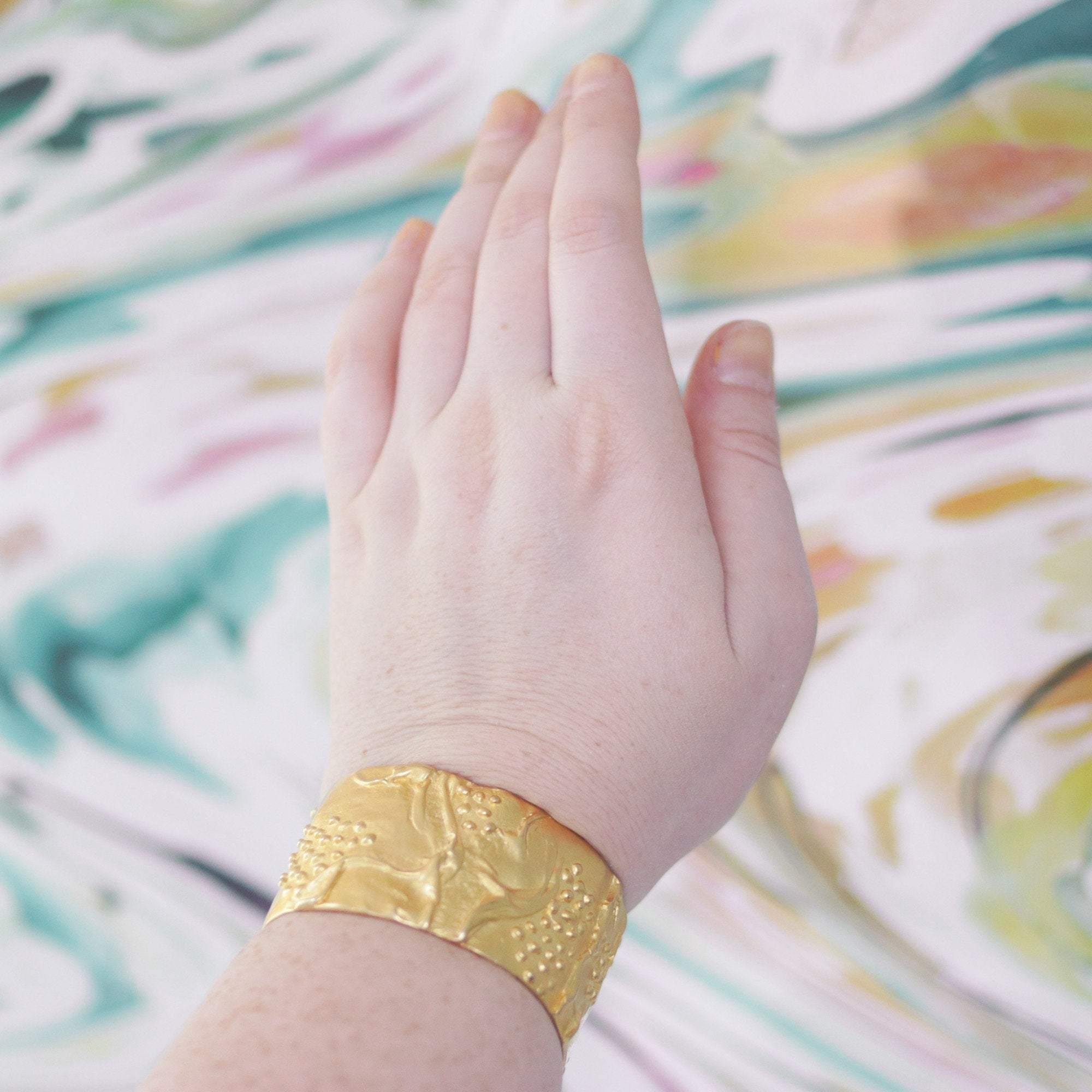 Vintage Kenneth Jay Lane Gold Cuff Bracelet by Kenneth Jay Lane - Vintage Meet Modern Vintage Jewelry - Chicago, Illinois - #oldhollywoodglamour #vintagemeetmodern #designervintage #jewelrybox #antiquejewelry #vintagejewelry