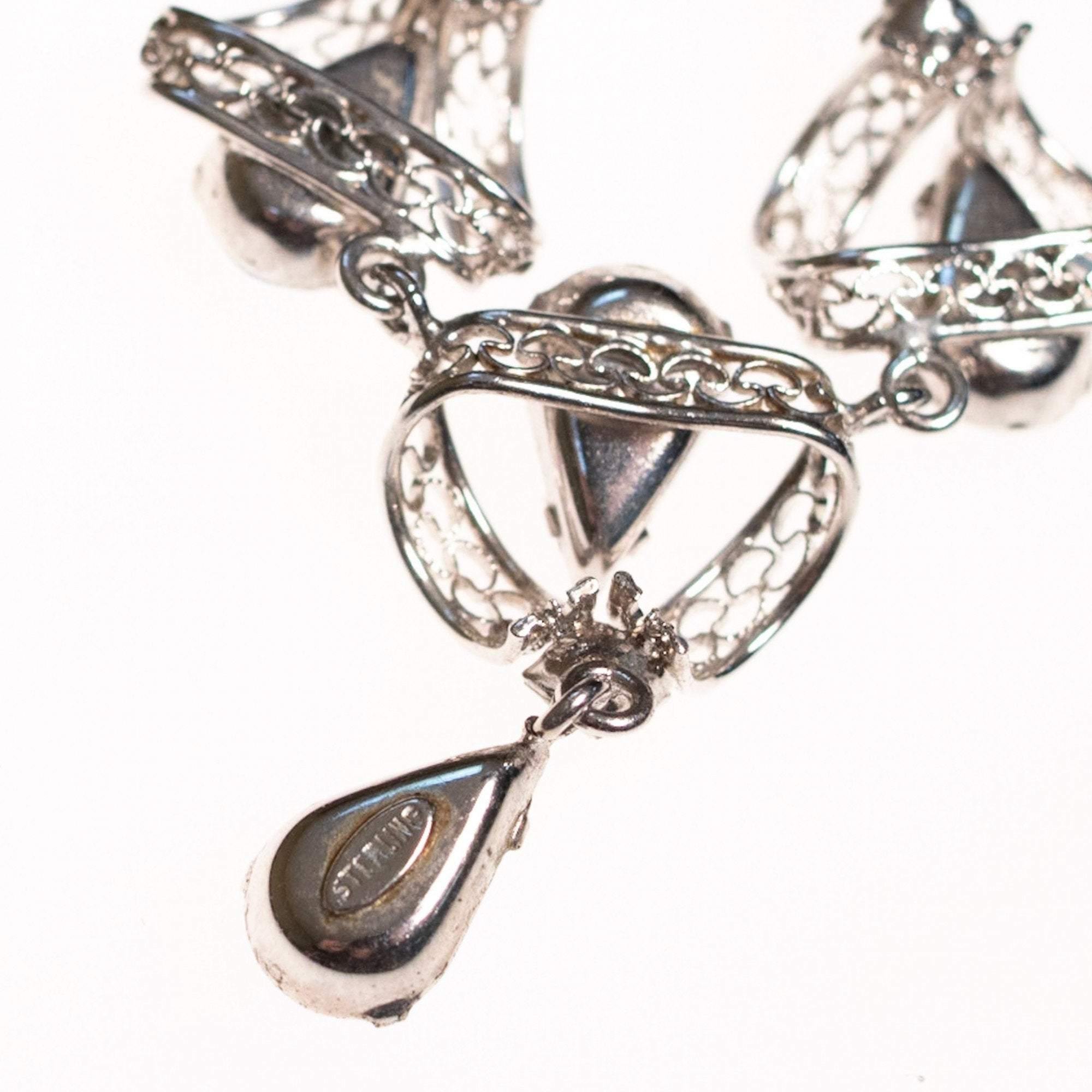 Vintage 1950s Silver Filigree Lavalier Necklace with Blue Crystals by Sterling Silver - Vintage Meet Modern Vintage Jewelry - Chicago, Illinois - #oldhollywoodglamour #vintagemeetmodern #designervintage #jewelrybox #antiquejewelry #vintagejewelry