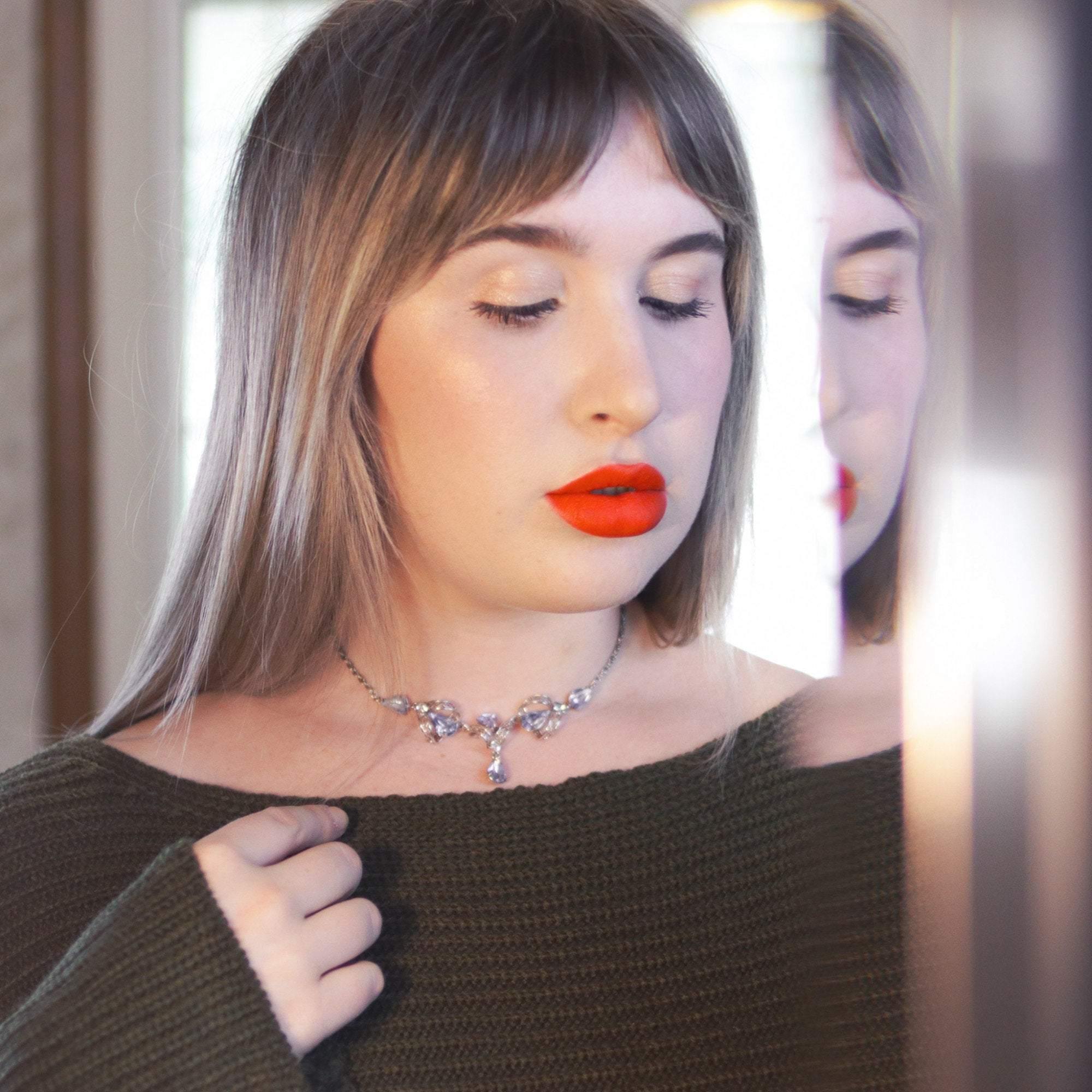 Vintage 1950s Silver Filigree Lavalier Necklace with Blue Crystals by Sterling Silver - Vintage Meet Modern Vintage Jewelry - Chicago, Illinois - #oldhollywoodglamour #vintagemeetmodern #designervintage #jewelrybox #antiquejewelry #vintagejewelry