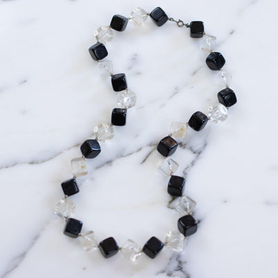 Vintage 1950s Square Clear and Black Chunky Lucite Beaded Necklace by Lucite - Vintage Meet Modern Vintage Jewelry - Chicago, Illinois - #oldhollywoodglamour #vintagemeetmodern #designervintage #jewelrybox #antiquejewelry #vintagejewelry