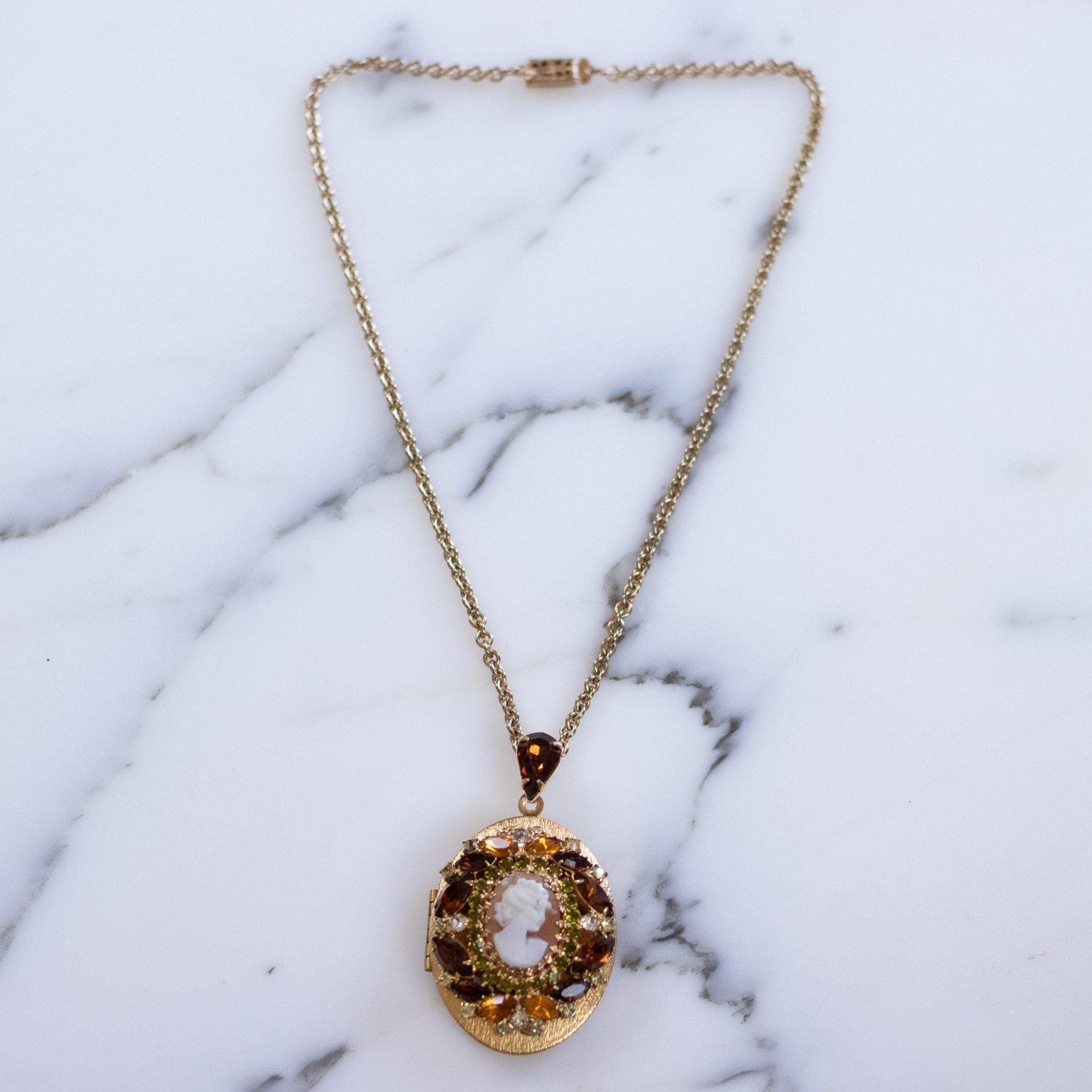 Vintage 1950s Hobe Cameo Locket with Amber, Citrine, and Light Green Rhinestones by Hobe - Vintage Meet Modern Vintage Jewelry - Chicago, Illinois - #oldhollywoodglamour #vintagemeetmodern #designervintage #jewelrybox #antiquejewelry #vintagejewelry