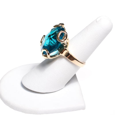 Vintage Blue Crystal Cocktail Statement Ring in Elegant Gold Tone Setting by 1980s - Vintage Meet Modern Vintage Jewelry - Chicago, Illinois - #oldhollywoodglamour #vintagemeetmodern #designervintage #jewelrybox #antiquejewelry #vintagejewelry