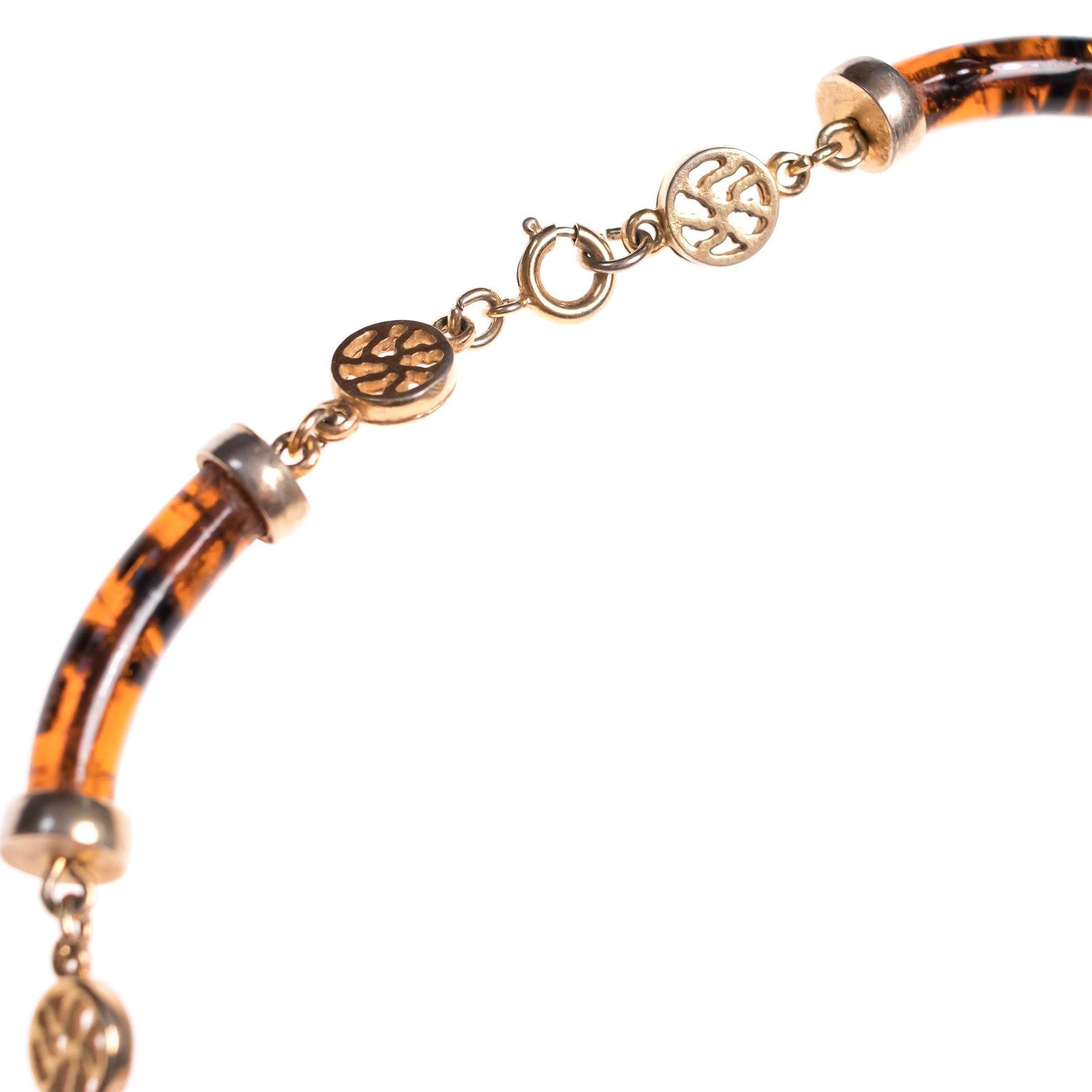 Vintage 1960s Tortoise Glass Barrel Bead Necklace with Asian Characters by 1960s - Vintage Meet Modern Vintage Jewelry - Chicago, Illinois - #oldhollywoodglamour #vintagemeetmodern #designervintage #jewelrybox #antiquejewelry #vintagejewelry