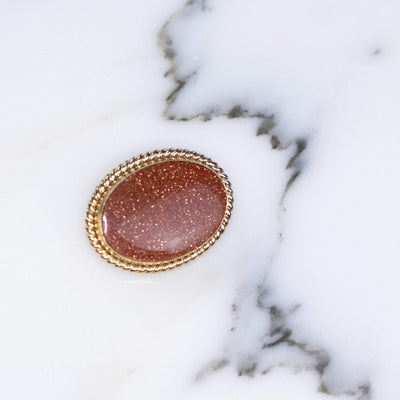 Vintage 1950s Petite Oval Goldstone Brooch Set in Gold Tone by 1950s - Vintage Meet Modern Vintage Jewelry - Chicago, Illinois - #oldhollywoodglamour #vintagemeetmodern #designervintage #jewelrybox #antiquejewelry #vintagejewelry