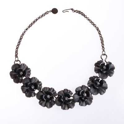 Vintage Grey Lucite Flower Necklace with Rhinestones Center by 1950s - Vintage Meet Modern Vintage Jewelry - Chicago, Illinois - #oldhollywoodglamour #vintagemeetmodern #designervintage #jewelrybox #antiquejewelry #vintagejewelry
