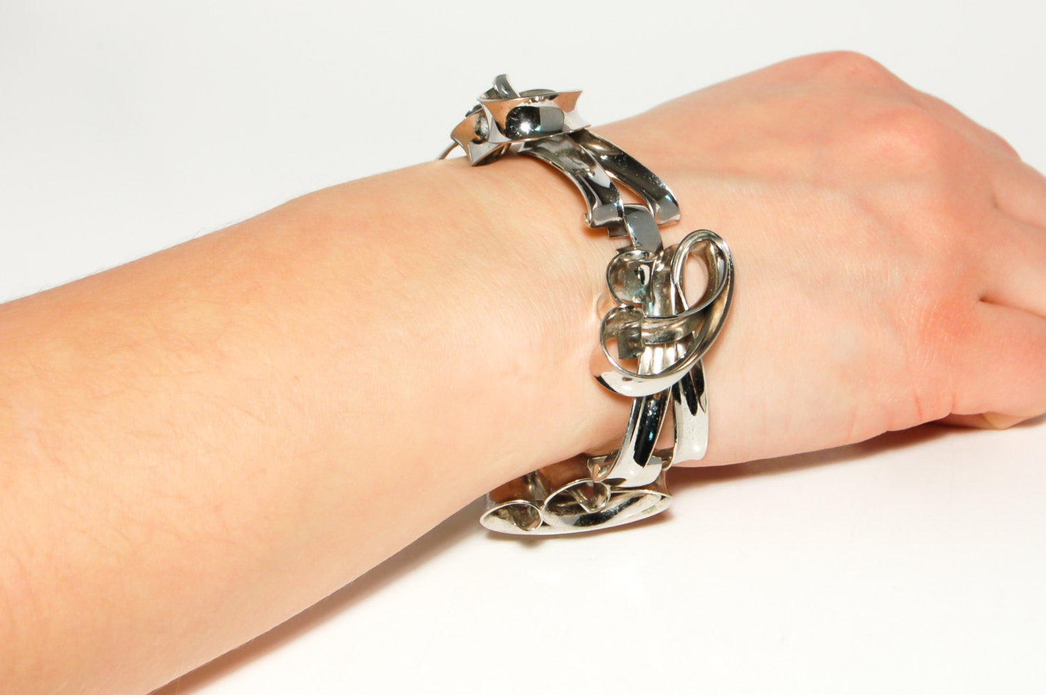 Napier Modernist Silver Large Link Curving Interlocking Artistic Sculptural Link Bracelet Silver Tone by Napier - Vintage Meet Modern Vintage Jewelry - Chicago, Illinois - #oldhollywoodglamour #vintagemeetmodern #designervintage #jewelrybox #antiquejewelry #vintagejewelry