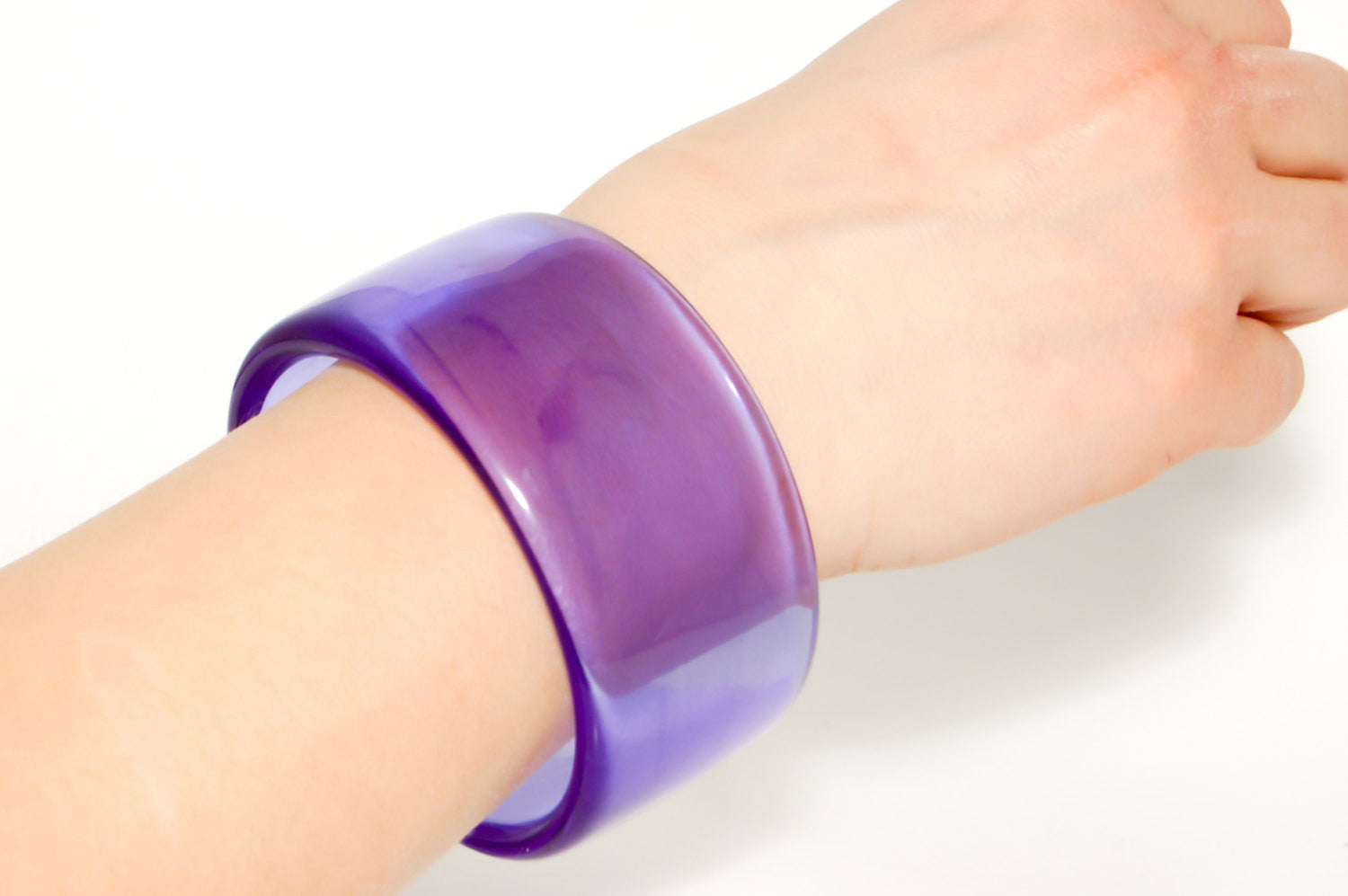 Wide Purple Lucite Bangle by Givenchy by Givenchy - Vintage Meet Modern Vintage Jewelry - Chicago, Illinois - #oldhollywoodglamour #vintagemeetmodern #designervintage #jewelrybox #antiquejewelry #vintagejewelry