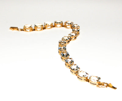 White Sapphire 10kt Gold Large Oval Faceted Pale Green Blue Zircon Tennis Line Style Bracelet by 1980s - Vintage Meet Modern Vintage Jewelry - Chicago, Illinois - #oldhollywoodglamour #vintagemeetmodern #designervintage #jewelrybox #antiquejewelry #vintagejewelry
