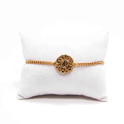 Gold Tone Petite Logo Bracelet by Christian Dior by Christian Dior - Vintage Meet Modern Vintage Jewelry - Chicago, Illinois - #oldhollywoodglamour #vintagemeetmodern #designervintage #jewelrybox #antiquejewelry #vintagejewelry