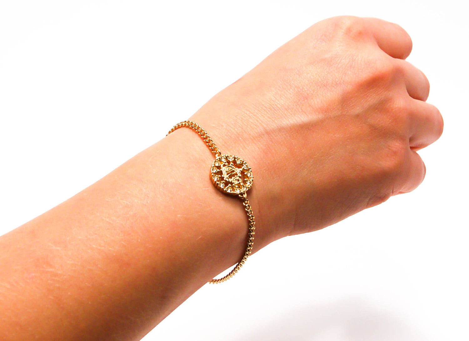 Gold Tone Petite Logo Bracelet by Christian Dior by Christian Dior - Vintage Meet Modern Vintage Jewelry - Chicago, Illinois - #oldhollywoodglamour #vintagemeetmodern #designervintage #jewelrybox #antiquejewelry #vintagejewelry