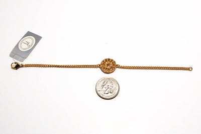 Gold Tone Petite Logo Bracelet by Christian Dior by Christian Dior - Vintage Meet Modern Vintage Jewelry - Chicago, Illinois - #oldhollywoodglamour #vintagemeetmodern #designervintage #jewelrybox #antiquejewelry #vintagejewelry