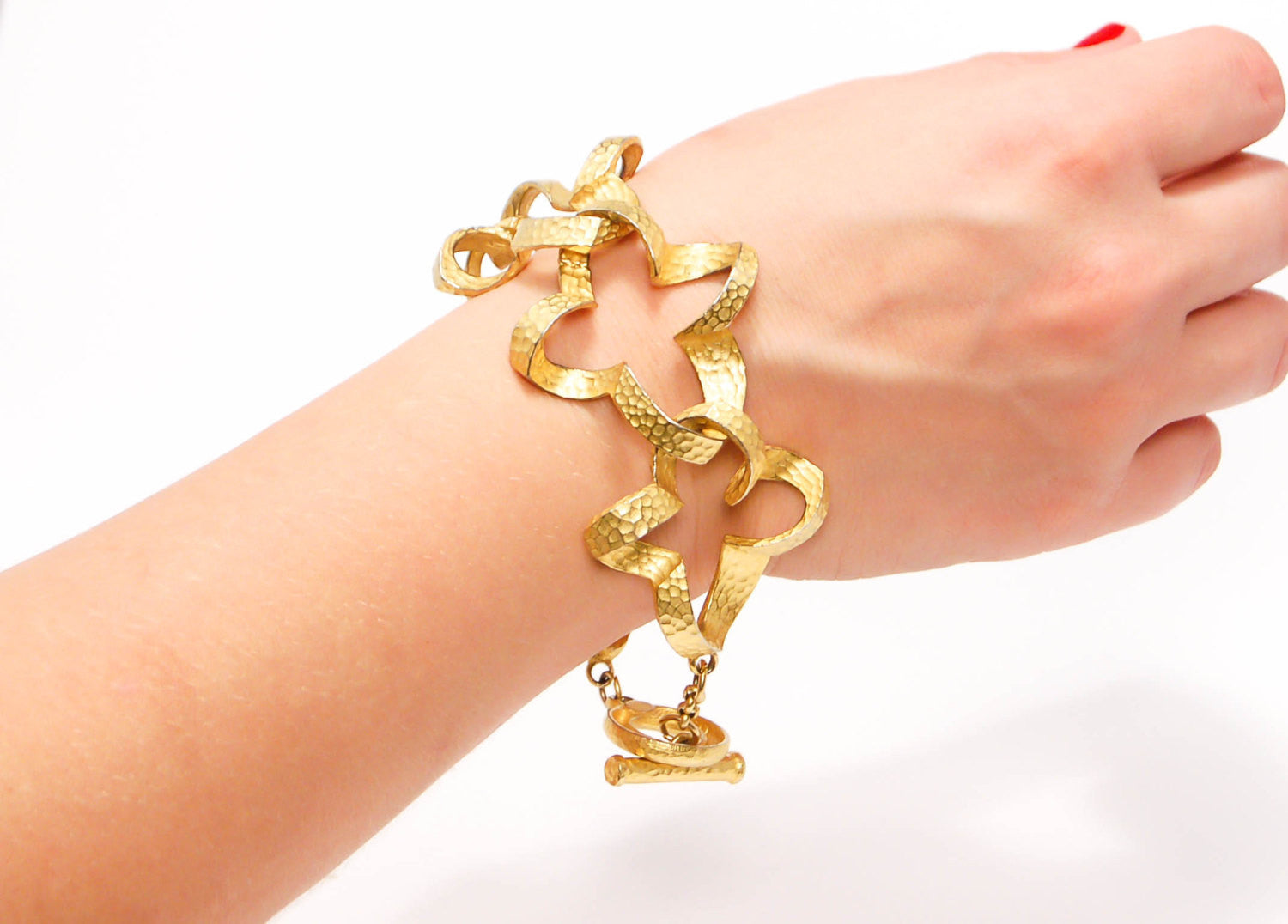 Gold Tone Quatrefoil Link Bracelet by Givenchy by Givenchy - Vintage Meet Modern Vintage Jewelry - Chicago, Illinois - #oldhollywoodglamour #vintagemeetmodern #designervintage #jewelrybox #antiquejewelry #vintagejewelry