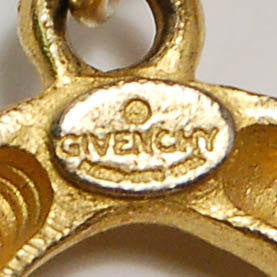 Gold Tone Quatrefoil Link Bracelet by Givenchy by Givenchy - Vintage Meet Modern Vintage Jewelry - Chicago, Illinois - #oldhollywoodglamour #vintagemeetmodern #designervintage #jewelrybox #antiquejewelry #vintagejewelry