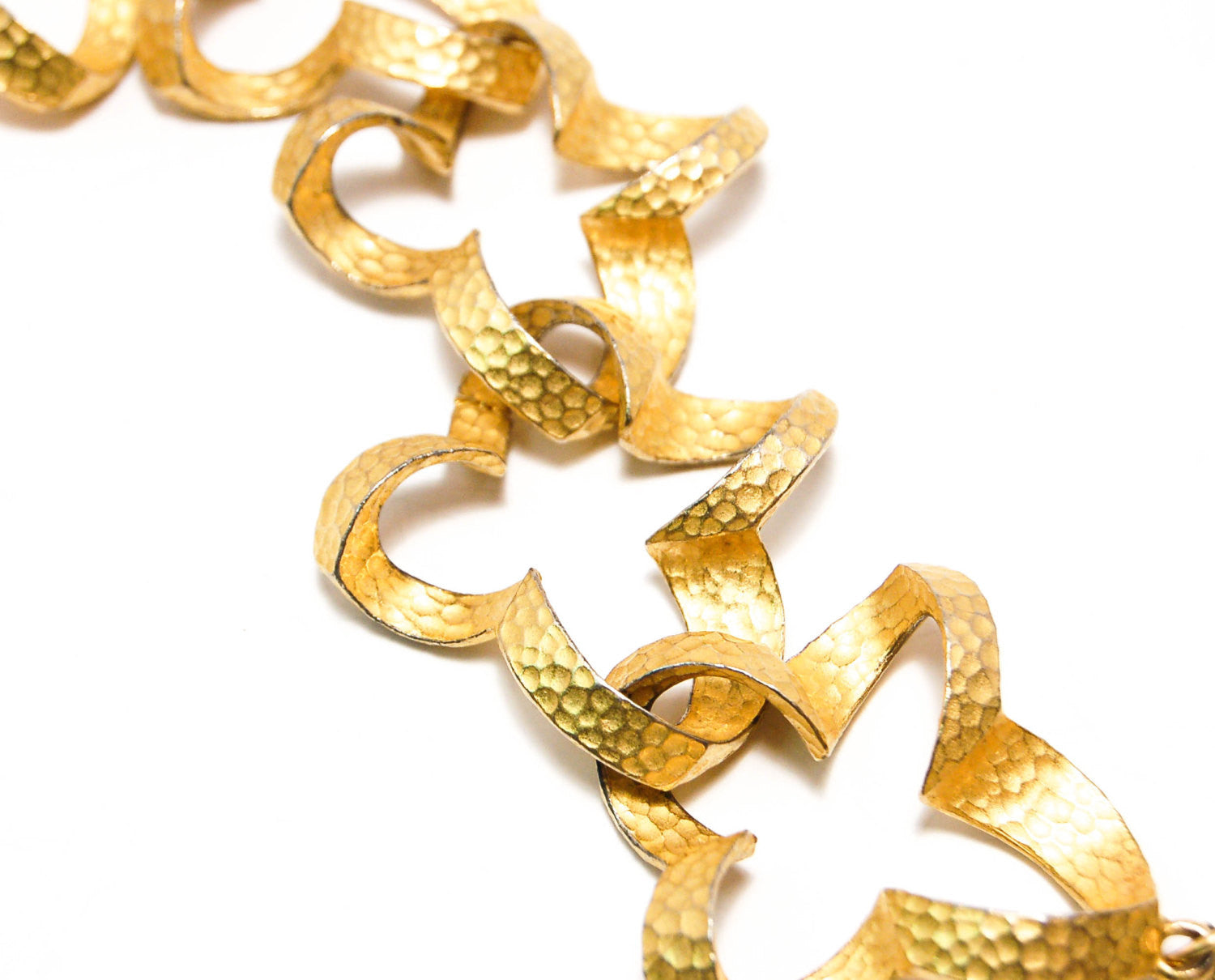 Gold Tone Quatrefoil Link Bracelet by Givenchy by Givenchy - Vintage Meet Modern Vintage Jewelry - Chicago, Illinois - #oldhollywoodglamour #vintagemeetmodern #designervintage #jewelrybox #antiquejewelry #vintagejewelry