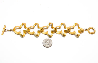 Gold Tone Quatrefoil Link Bracelet by Givenchy by Givenchy - Vintage Meet Modern Vintage Jewelry - Chicago, Illinois - #oldhollywoodglamour #vintagemeetmodern #designervintage #jewelrybox #antiquejewelry #vintagejewelry