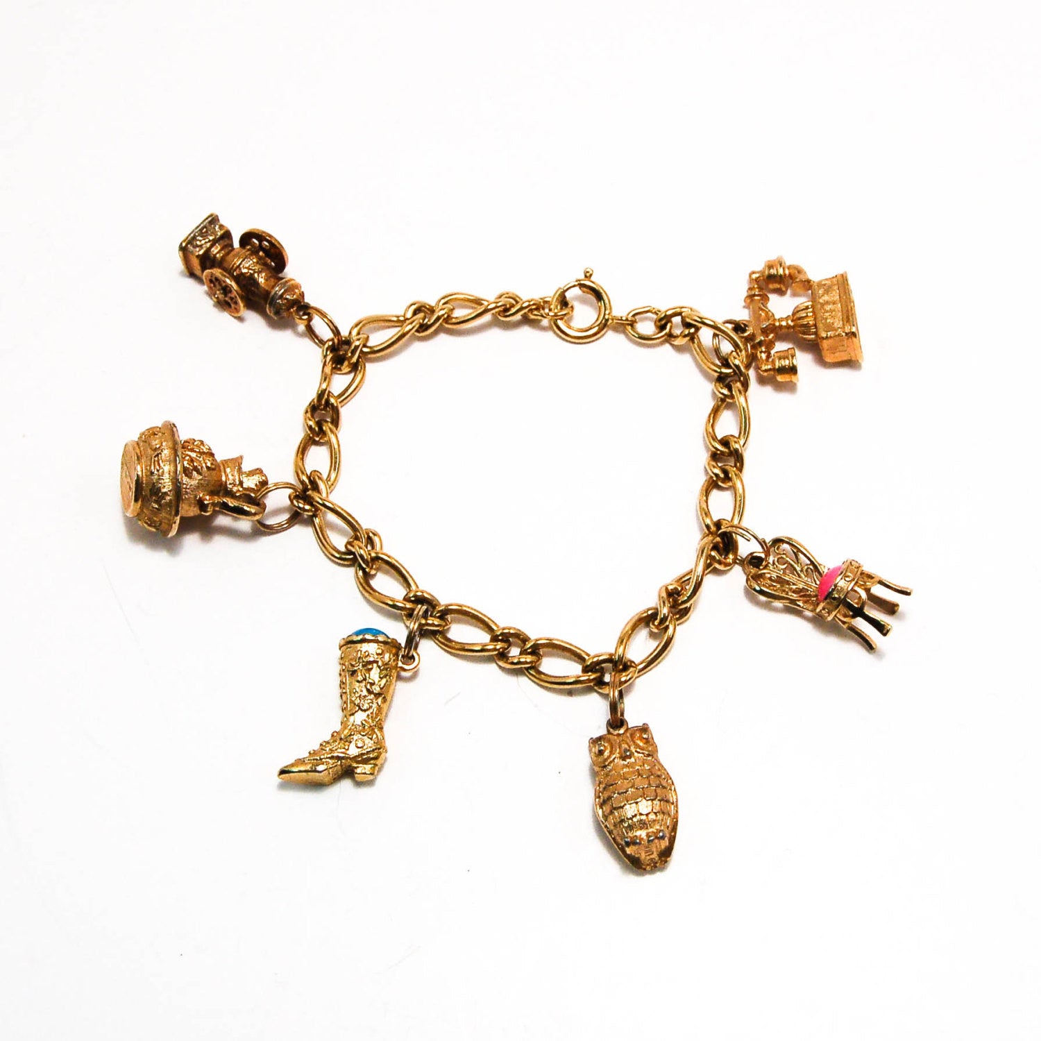1970's 14kt Gold Plated Charm Bracelet by Avon by Avon - Vintage Meet Modern Vintage Jewelry - Chicago, Illinois - #oldhollywoodglamour #vintagemeetmodern #designervintage #jewelrybox #antiquejewelry #vintagejewelry
