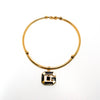1970's Gold and Black Logo Necklace by Givenchy by Givenchy - Vintage Meet Modern Vintage Jewelry - Chicago, Illinois - #oldhollywoodglamour #vintagemeetmodern #designervintage #jewelrybox #antiquejewelry #vintagejewelry