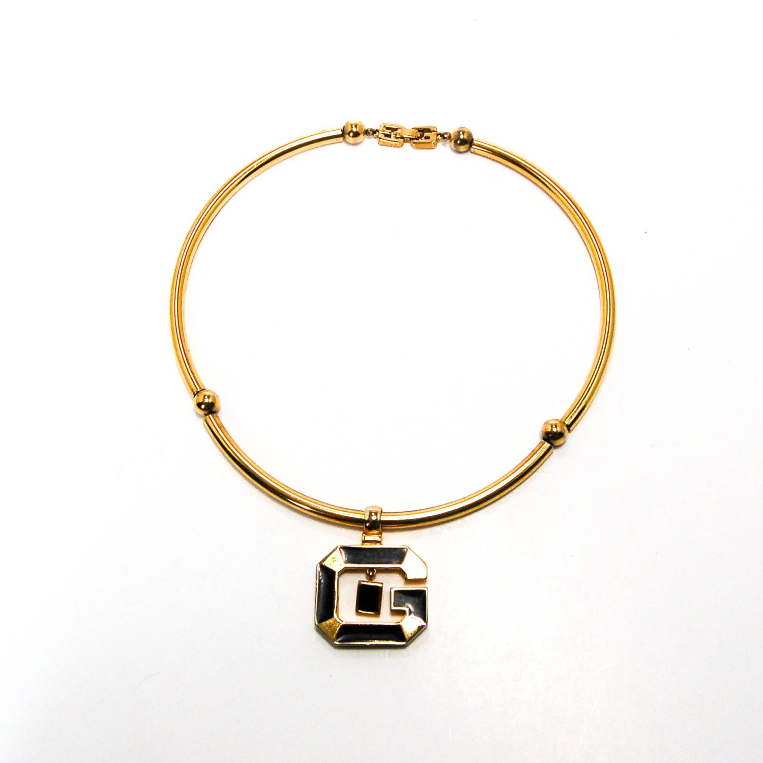 1970's Gold and Black Logo Necklace by Givenchy by Givenchy - Vintage Meet Modern Vintage Jewelry - Chicago, Illinois - #oldhollywoodglamour #vintagemeetmodern #designervintage #jewelrybox #antiquejewelry #vintagejewelry