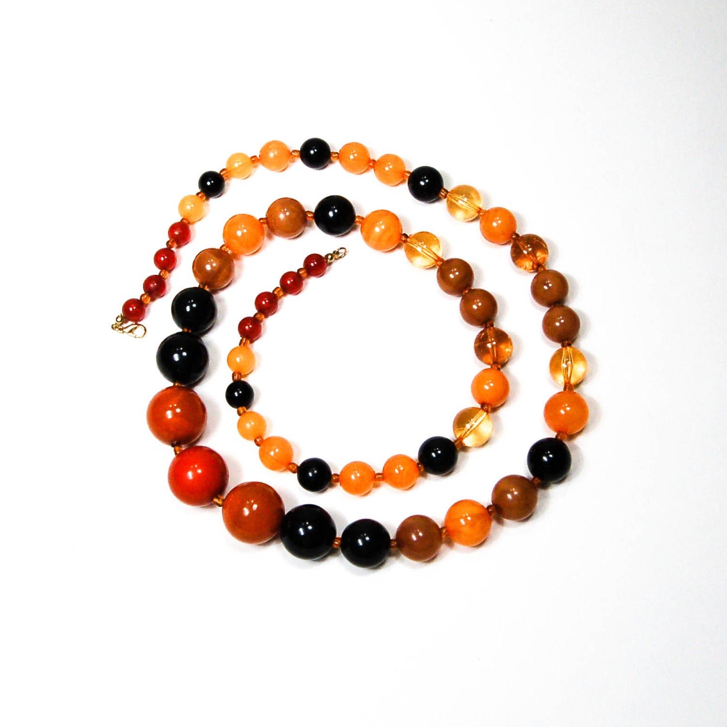 Orange, Black, Brown Lucite Bubble Bead Retro Necklace by 1960s Vintage - Vintage Meet Modern Vintage Jewelry - Chicago, Illinois - #oldhollywoodglamour #vintagemeetmodern #designervintage #jewelrybox #antiquejewelry #vintagejewelry