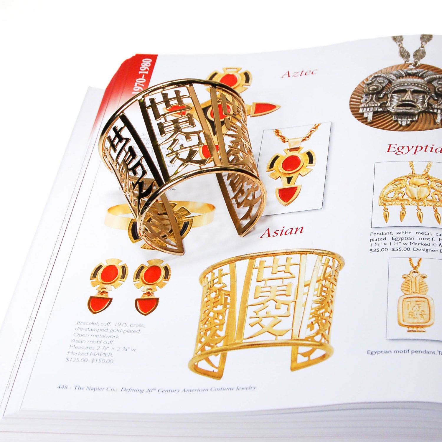 Wide Gold Tone Asian Theme Cuff Bracelet by Napier by Napier - Vintage Meet Modern Vintage Jewelry - Chicago, Illinois - #oldhollywoodglamour #vintagemeetmodern #designervintage #jewelrybox #antiquejewelry #vintagejewelry