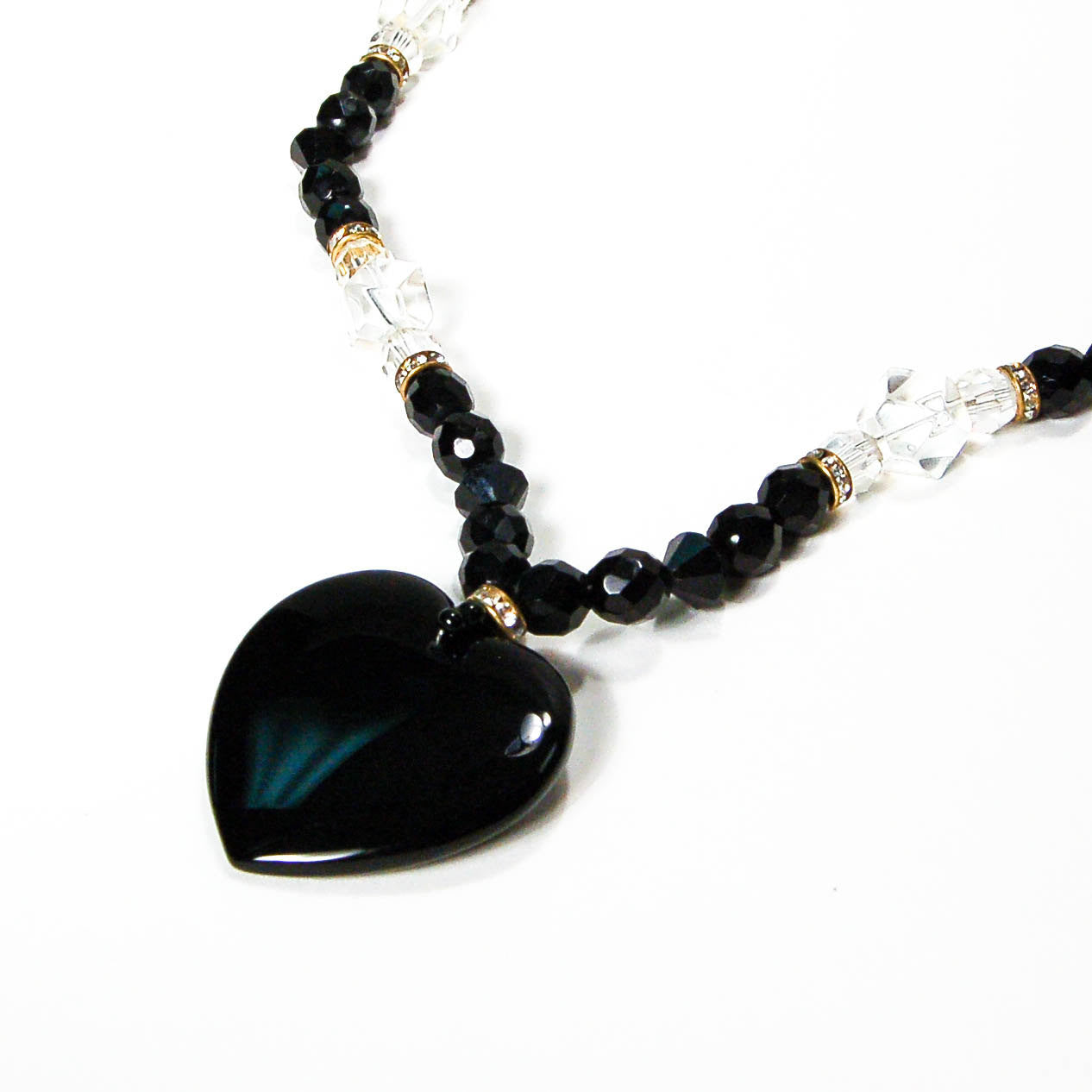 Black and Cut Crystal Heart Necklace by 1980s - Vintage Meet Modern Vintage Jewelry - Chicago, Illinois - #oldhollywoodglamour #vintagemeetmodern #designervintage #jewelrybox #antiquejewelry #vintagejewelry