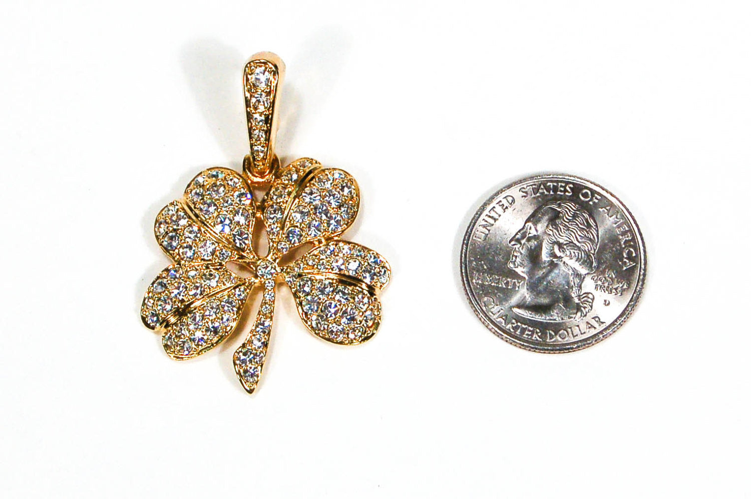 Gold Tone Rhinestone Shamrock Pendant by KJL by KJL - Vintage Meet Modern Vintage Jewelry - Chicago, Illinois - #oldhollywoodglamour #vintagemeetmodern #designervintage #jewelrybox #antiquejewelry #vintagejewelry
