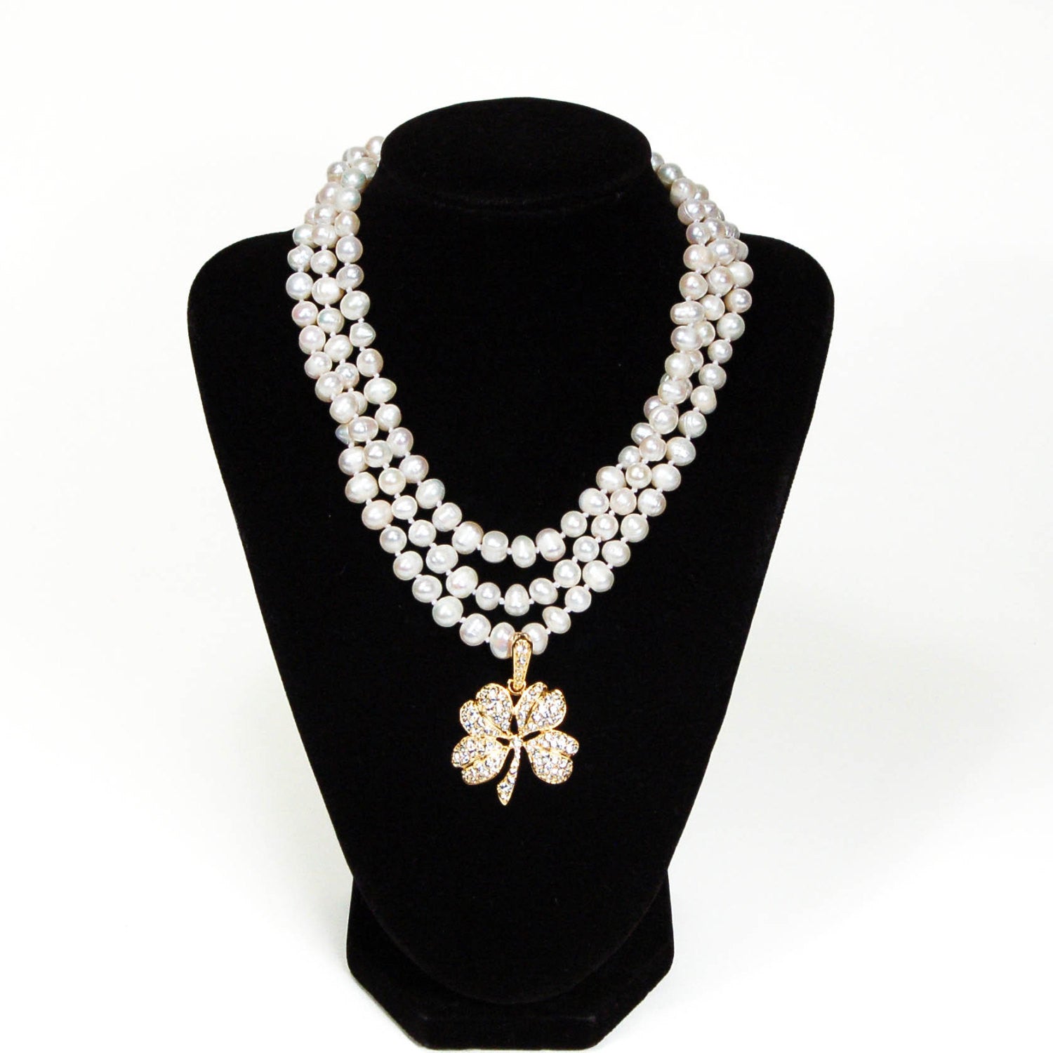 Gold Tone Rhinestone Shamrock Pendant by KJL by KJL - Vintage Meet Modern Vintage Jewelry - Chicago, Illinois - #oldhollywoodglamour #vintagemeetmodern #designervintage #jewelrybox #antiquejewelry #vintagejewelry
