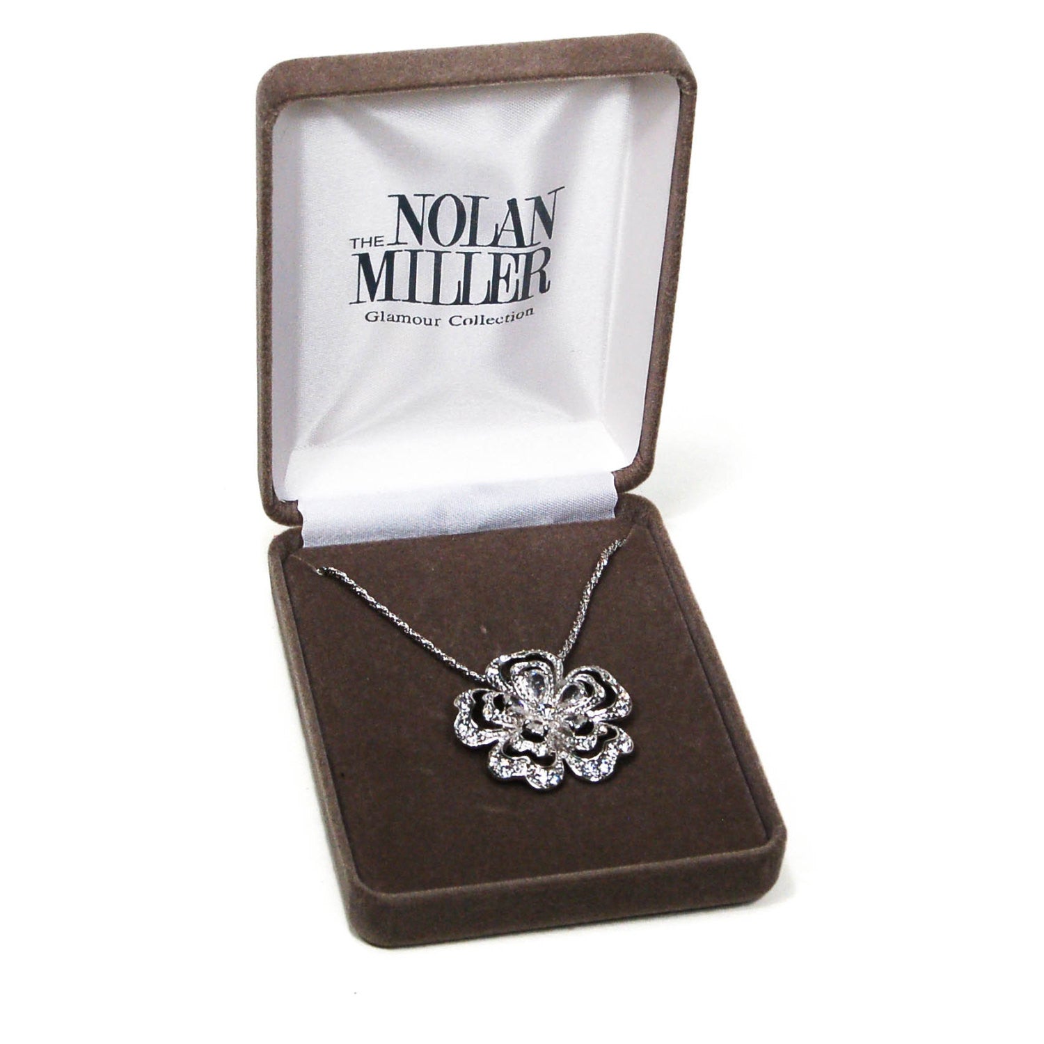 Sparkling Cubic Zirconia Flower Pendant Necklace by Nolan Miller by vintagemeetmodern - Vintage Meet Modern Vintage Jewelry - Chicago, Illinois - #oldhollywoodglamour #vintagemeetmodern #designervintage #jewelrybox #antiquejewelry #vintagejewelry